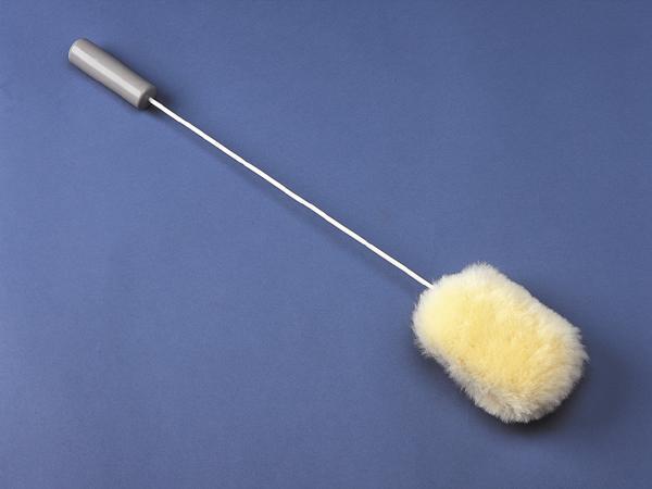 Long handled sheepskin pad